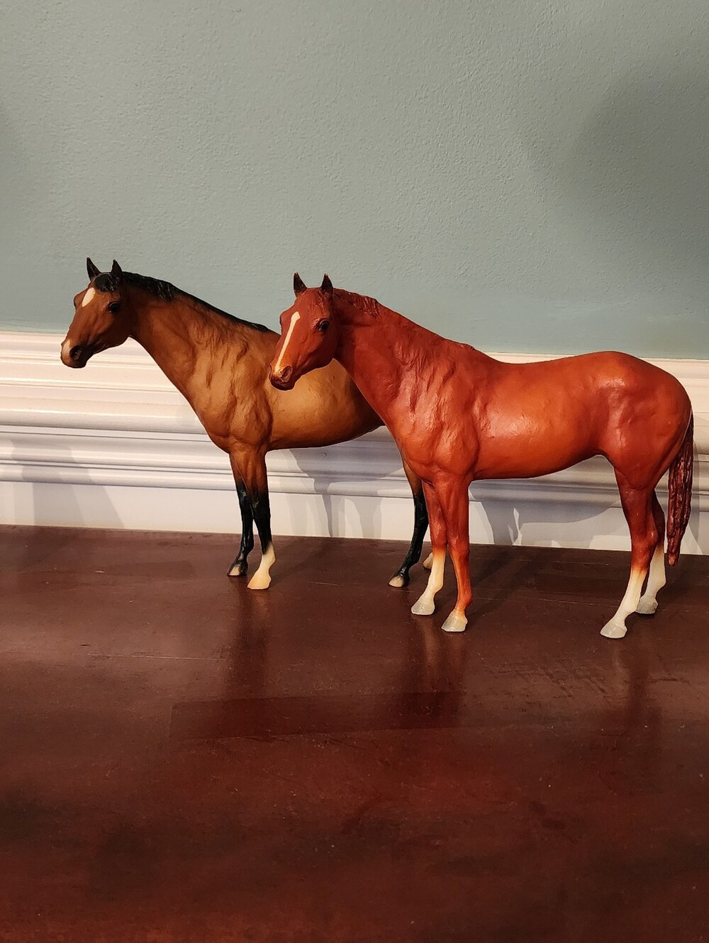 Two Breyer Secretariat Mold Horses